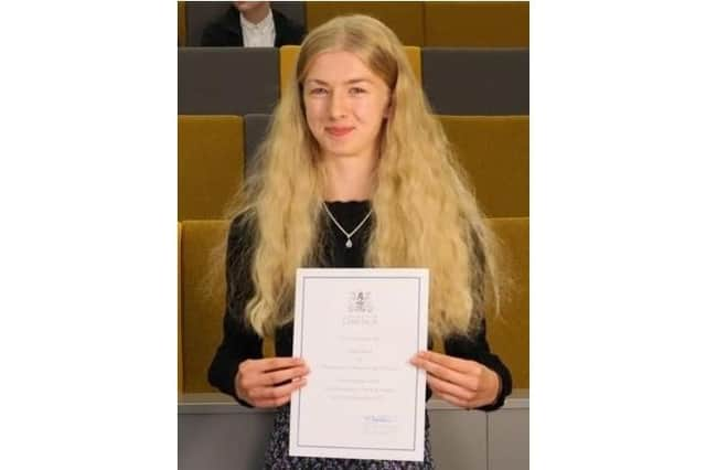 High School student Charlie Blair has scored the top mark in the country for her GCSE history exam.