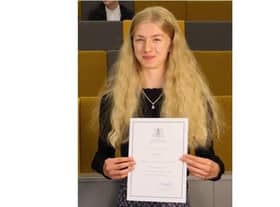 High School student Charlie Blair has scored the top mark in the country for her GCSE history exam.