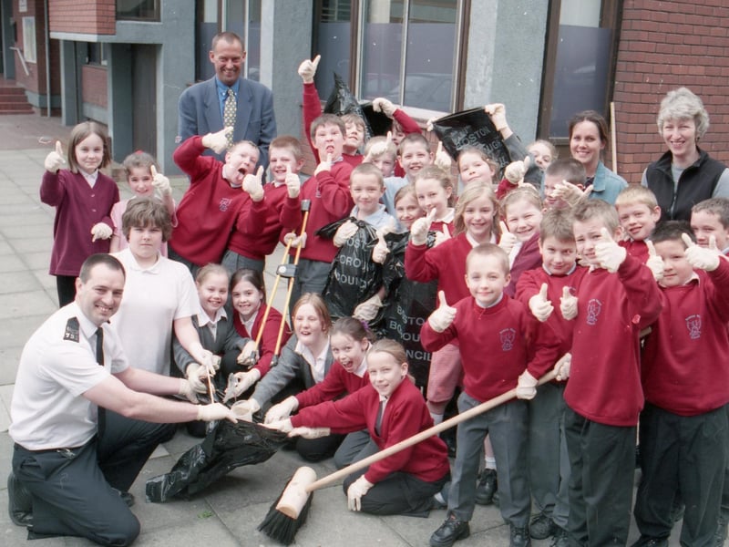 Boston West pupils supporting Boston Police in efforts to crackdown on litter in the town. They are pictured with Sgt Gary Brown.