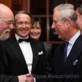 Adrian Benjamin (left) meets the then-Prince Charles in 2010.