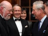 Adrian Benjamin (left) meets the then-Prince Charles in 2010.