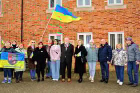 Ukrainian refugees are welcomed by Sleaford Town Council to a flag raising ceremony on Monday showing solidarity and support for their homeland. Photo: Roderick Carlyle