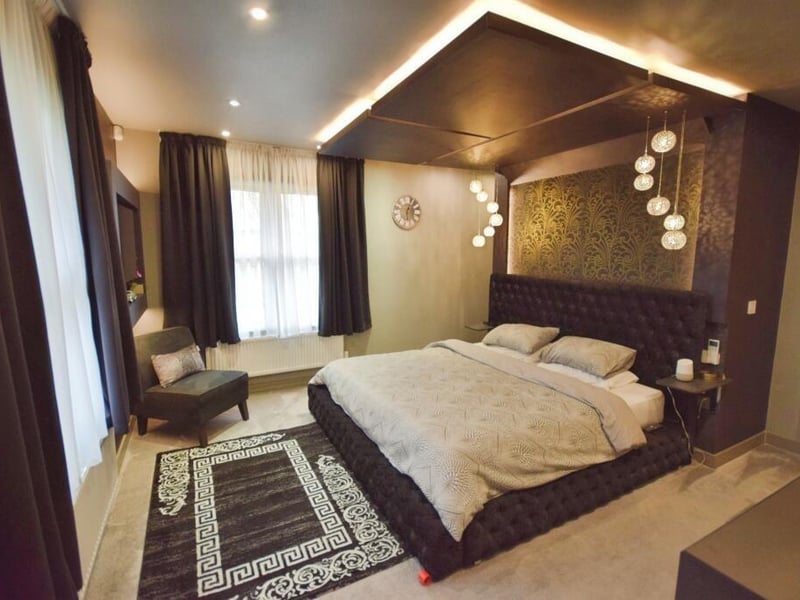 The principal bedroom and ...