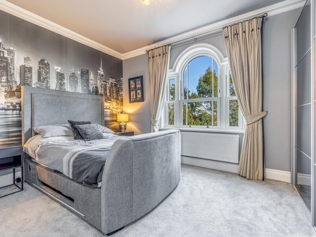 One of the other five bedrooms.