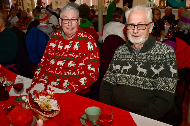 Brothers (from left)  Anthony Young and Colin Young rocking those Christmas sweaters at the Wainfleet Methodist Church community meal.