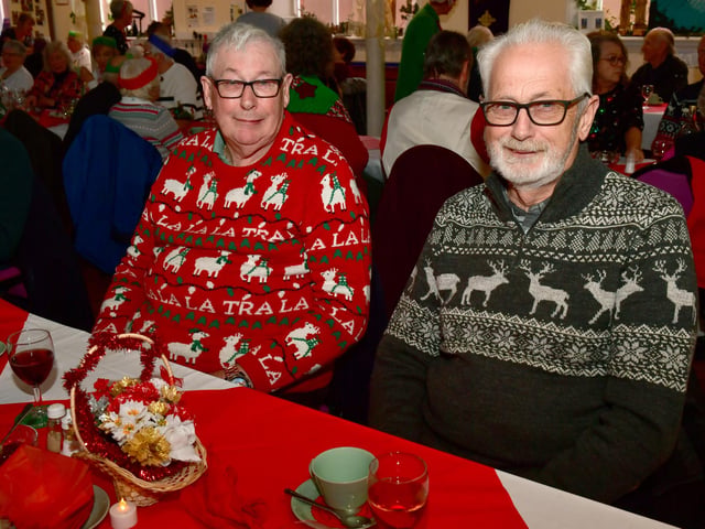Brothers (from left) Anthony Young and Colin Young rocking those Christmas sweaters at the Wainfleet Methodist Church community meal.