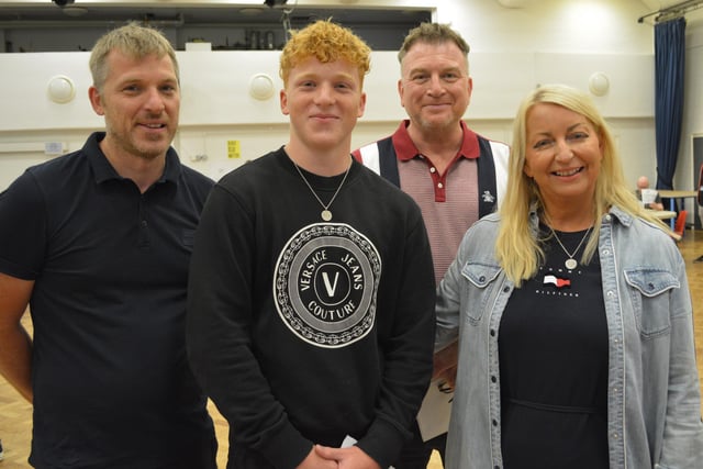 Sportsman Curtis Spencer achieved the grades required to take up his place at Hartpury College in Gloucester, which has a strong Rugby culture. He is pictured with dad Paul, left, mum Louise and De Aston head teacher Simon Porter
