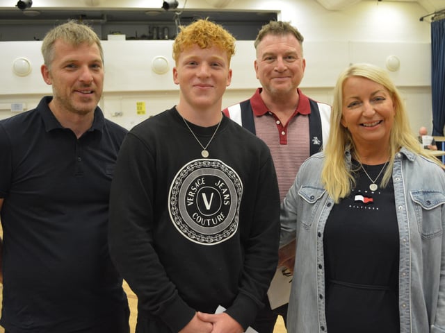 Sportsman Curtis Spencer achieved the grades required to take up his place at Hartpury College in Gloucester, which has a strong Rugby culture. He is pictured with dad Paul, left, mum Louise and De Aston head teacher Simon Porter