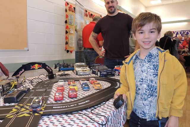 James Purnell of Sleaford tries out the slot car track run by former Caythorpe resident James McKendrick of That's Your Slot.