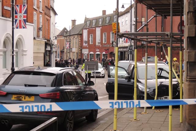 The car embedded in scaffolding outside Interflora in Sleaford on Sunday morning.