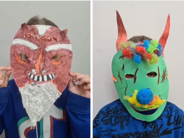 Two of the masks made by Lithuanian children in Boston for the upcoming festival.