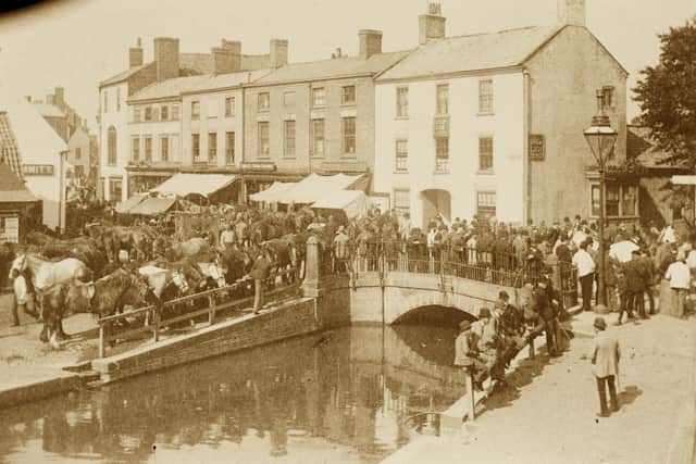 A photo of Horncastle Horse Fair in the Bull Ring and around the old Town Bridge in the early 1900s.