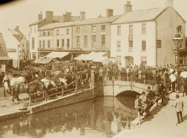 A photo of Horncastle Horse Fair in the Bull Ring and around the old Town Bridge in the early 1900s.