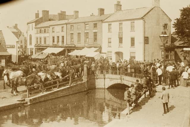 A photo of Horncastle Horse Fair in the Bull Ring and around the old Town Bridge in the early 1900s.