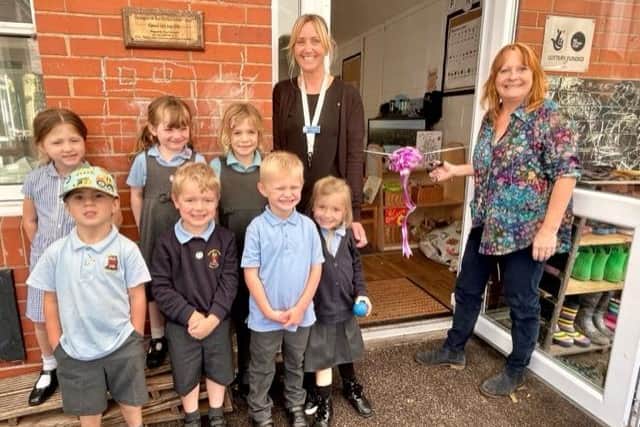 Donington on Bain staff and pupils celebrate the opening of the new classroom.