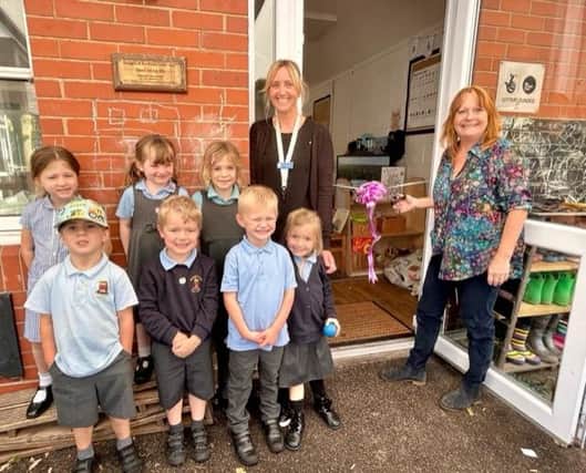 Donington on Bain staff and pupils celebrate the opening of the new classroom.