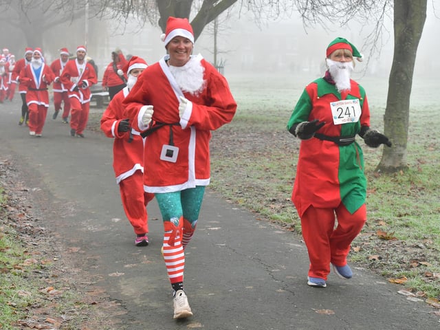 Action from this year's Boston Santa Run.