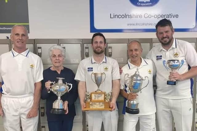 Keith Jackman, Mary Johnson, Lee Boucher, Paul Bark and Darren Trapmore with the trophy haul.