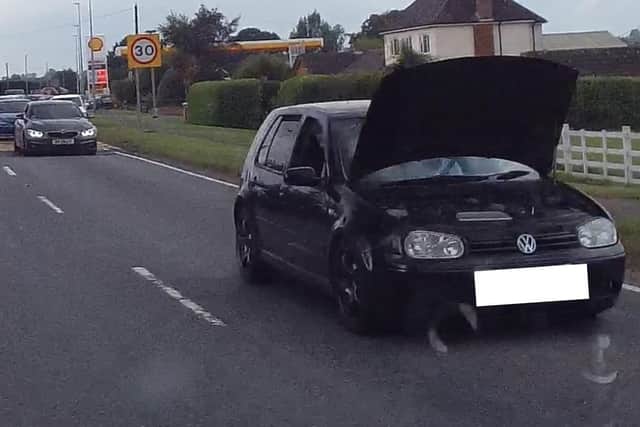 The car spotted driving with the bonnet up. Photo: Lincs Police RPU