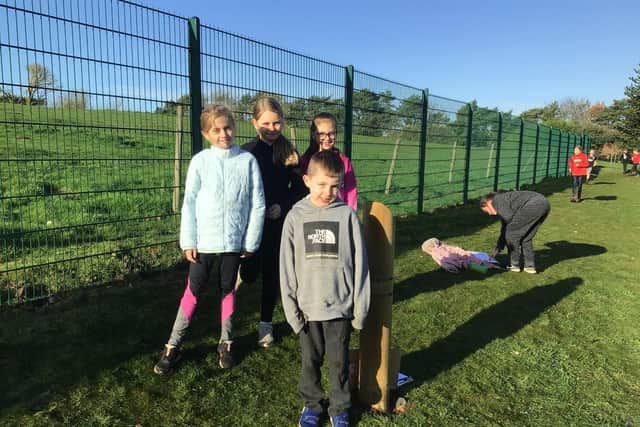 Scamblesby C of E Primary School taking part in a sponsored walk in memory of Dylan Jones.