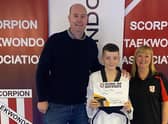 Cody Glen with coach Tony Morgan and assistant instructor Gillian Fairbrother