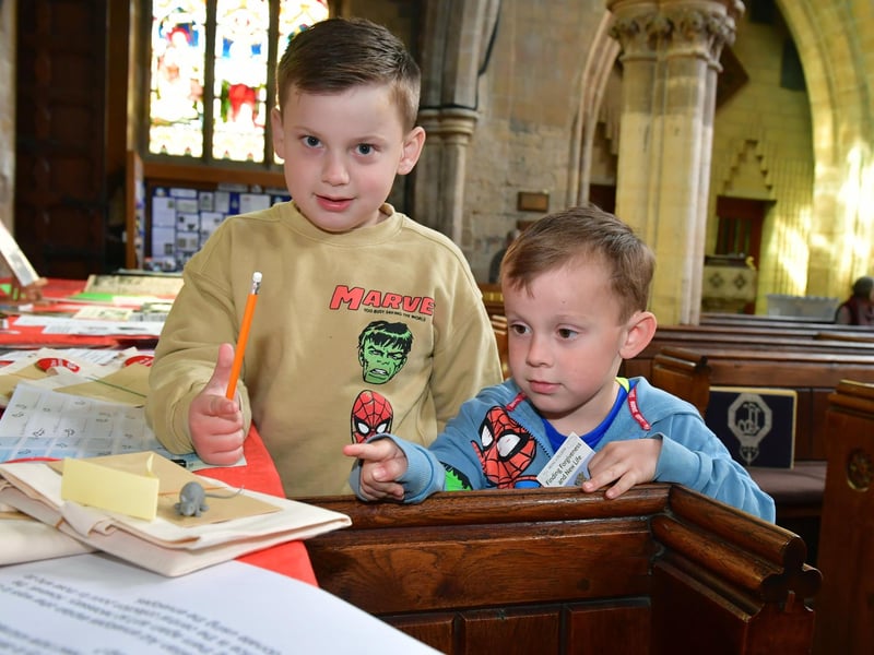 William McArdell, 6, and Edward McArdell, 5, of Horncastle, doing the Mouse Trail - just one of the children's activities at the open day. Photo: David Dawson