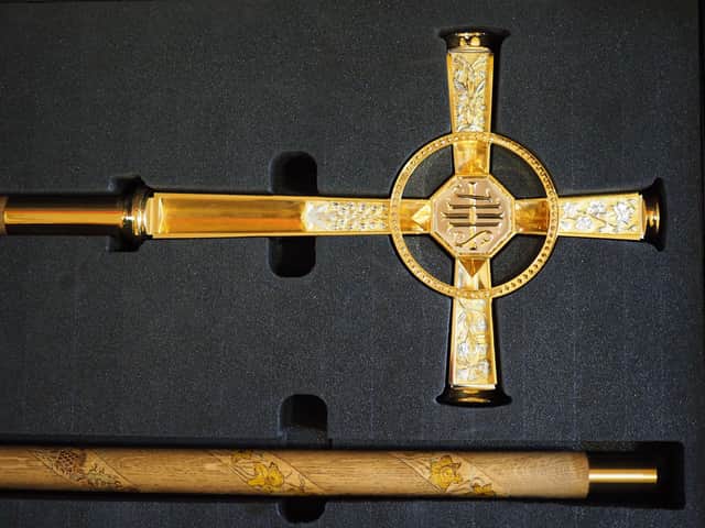 The shaft and cross