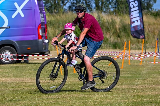 Chris Turner with a new recruit to the cycling club. Photo: Richard Howes Photography