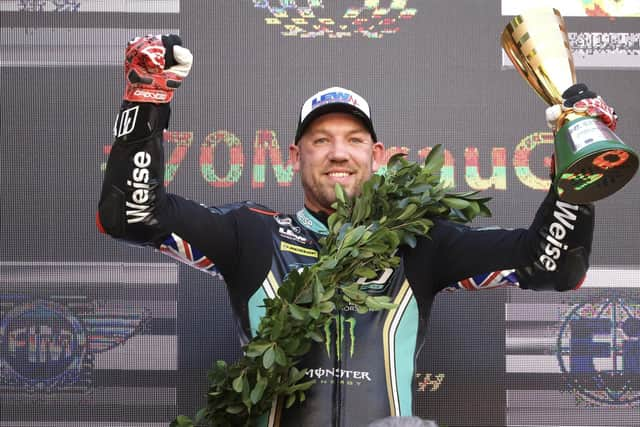 Peter Hickman with the Macau GP trophy. Photo by FHO Racing.