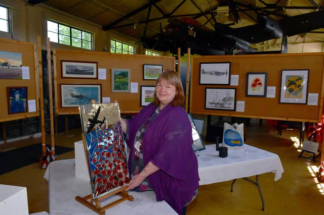 Exhibition organiser, Kate Sell of Harmston with her mosaic.