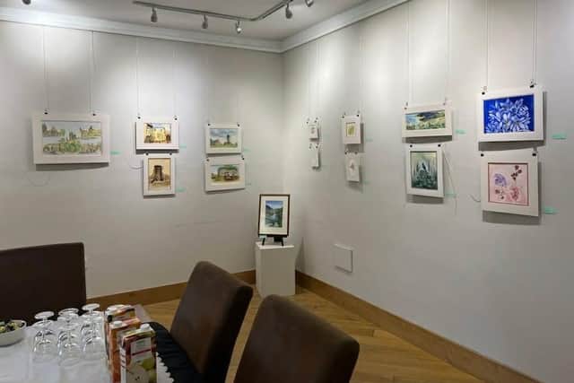 Mrs Westerby's paintings hanging in the Spout Yard Gallery in Louth.
