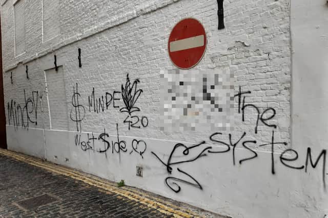 Bank Street, Boston, after the graffiti had been left on the side of HSBC.