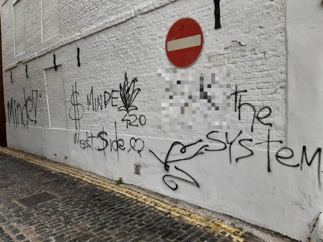 Bank Street, Boston, after the graffiti had been left on the side of HSBC.
