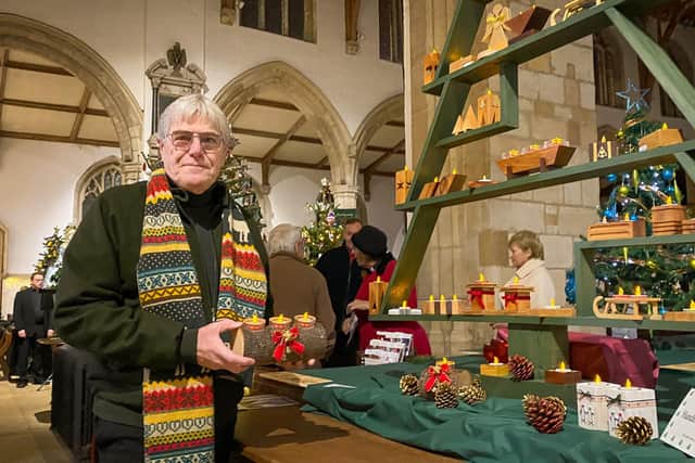 Woodworker Chris Myers with his modernist Christmas Tree and handmade Christmas Decorations.