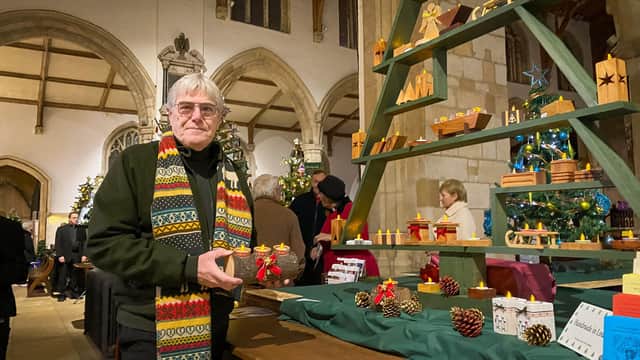 Woodworker Chris Myers with his modernist Christmas Tree and handmade Christmas Decorations.