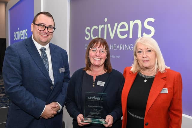 Scrivens Opticians & Hearing Care branch manager Jeanette Green receives the Branch of the Year Award for Market Deeping from regional manager Dan Abraham and area manager Suzanne French