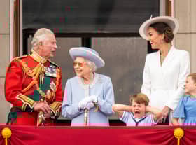 Then Prince of Wales (now King Charles III), Queen Elizabeth II, Prince Louis, the then Duchess of Cambridge (now the Princess of Wales)and Princess Charlotte on the balcony of Buckingham Palace after the Trooping the Colour ceremony at Horse Guards Parade, central London.