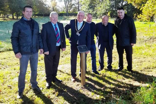 Mayor of Skegness Coun Tony Tye (centre) with other councillors for the unveiling of the Queen's Green Canopy (QGC) plaque.