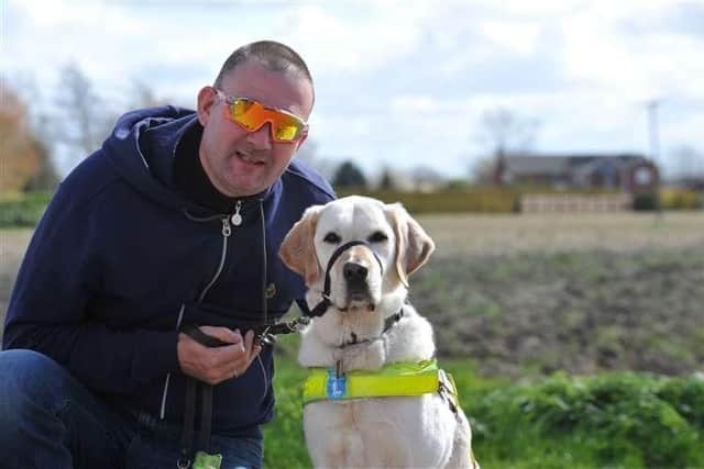 Guide dog owner Mark and his guide dog Dougal