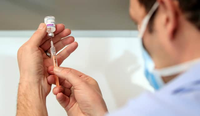 Chief Pharmacist Richard Harrison with the Oxford/AstraZeneca coronavirus vaccine at Askham Bar park-and-ride in York, as ten further mass vaccination centres opened in England with more than a million over-80s invited to receive their coronavirus jab. Picture date: Monday January 18, 2021.