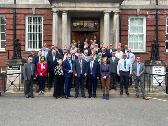 A group photo of Greater Lincolnshire Mayor Andrea Jenkyns and Boston and Skegness MP Richard Tice with Reform UK councillors outside County Offices