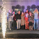 Managing director Peter Atterby, left, with some of the staff at a Sixties themed celebration held in Louth this month to mark 60 years in business. Image rights - Orange In The Wild