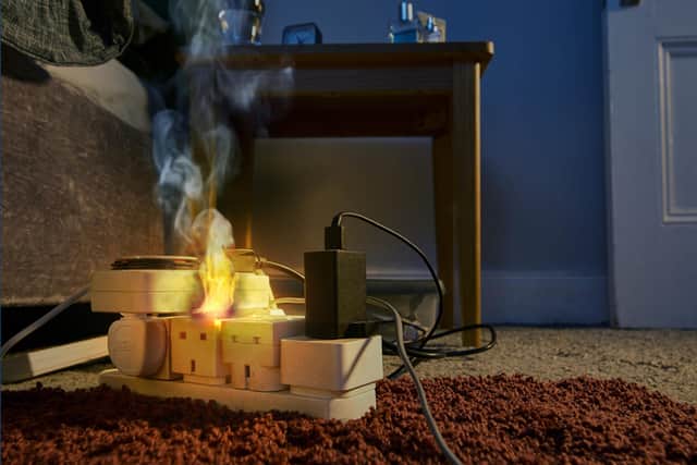 Fire kills: What can happen with an overloaded extension cable.