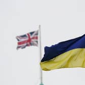 File photo dated 06/05/22 of an Ukrainian and Union flag flying. Up to 10,000 Ukrainians are being offered free English language lessons in a bid to improve their job prospects in the UK. Some of those who have fled the war in their homeland and settled in England, Wales, Scotland and Northern Ireland will be given almost 20 hours of online English learning a week over a period of 10 weeks, the Government said. The announcement comes on Ukrainian Independence Day. Issue date: Thursday August 24, 2023.