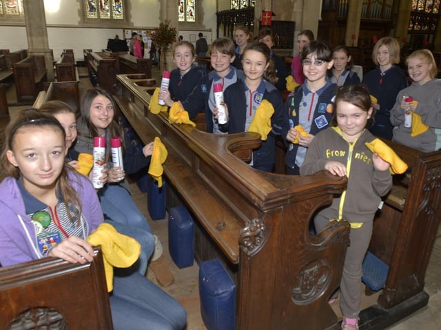 Brownies and Guides in Louth helping to clean the town's St James’ Church as part of a community project. Members of the 7th Louth Guides had also been collecting tins and packets to donate to the Community Larder.
