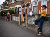 The survey found that more than half, 51 percent, of respondents would pay one to three percent more than the house is worth for good neighbours. (Photo by Leon Neal/Getty Images)