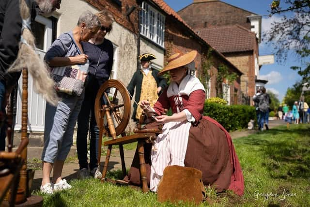 Visitors fascinated by the Folkingham Georgian Festival. Photo: Graydon Jones