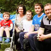 Pictured from left: Elisha, Ewelina, Ezekiel, Elijah, and Jonathan Greenwood.