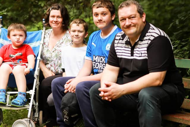 Pictured from left: Elisha, Ewelina, Ezekiel, Elijah, and Jonathan Greenwood.