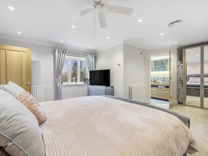 One of the bedrooms and ...